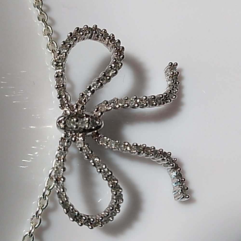 Affinity bow necklace.